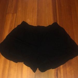 Flowy black fabric shorts